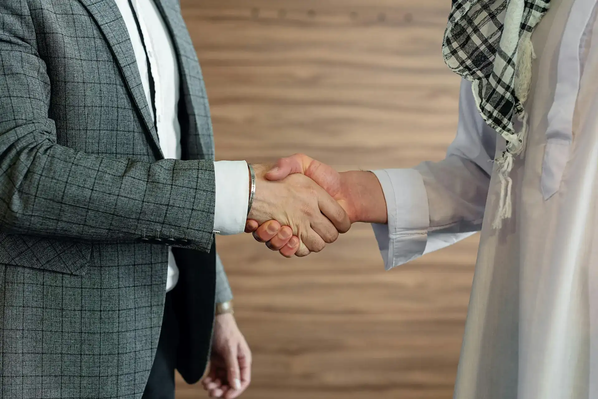 Entrepreneurs shaking hands, forming a new co-founder partnership